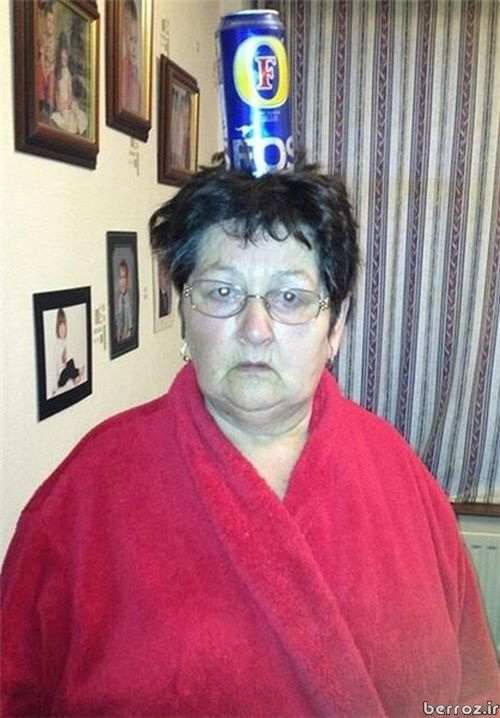 Interesting Photos -Granny holding microwave on her head (2)