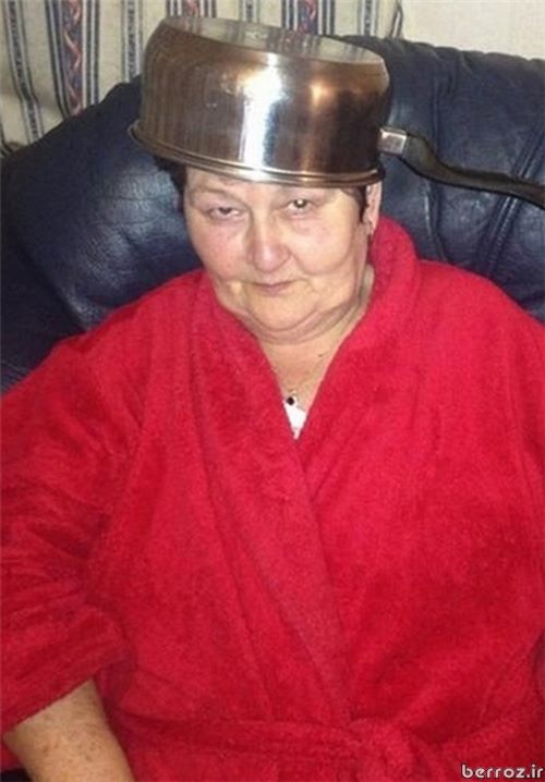 Interesting Photos -Granny holding microwave on her head (3)