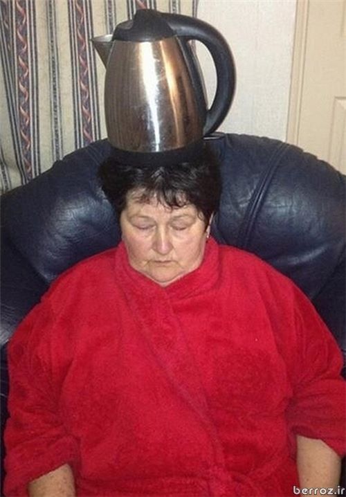 Interesting Photos -Granny holding microwave on her head (4)
